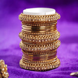 Set of 16 Golden Metal Bangle Set by Leshya
