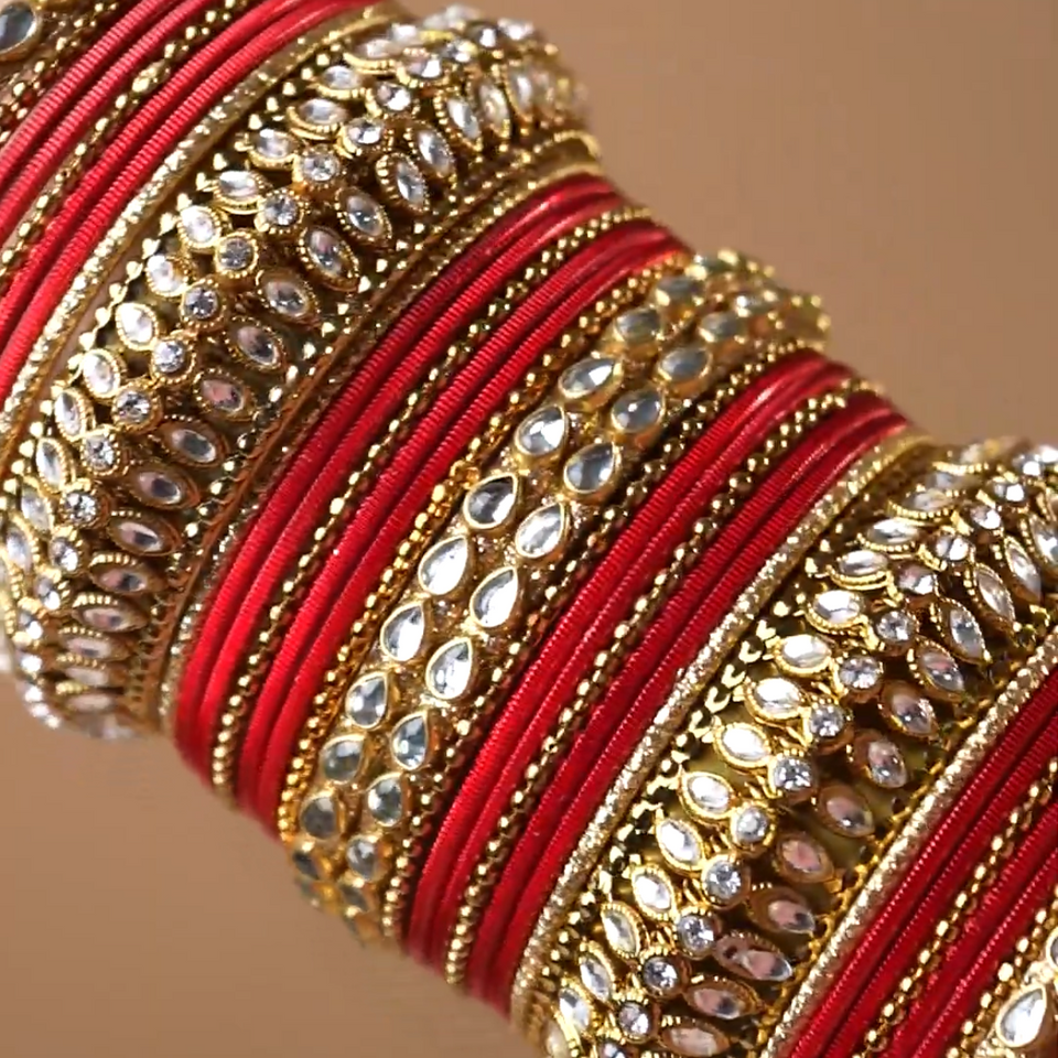 Set of 34 Shining Kundan bangle set by Leshya