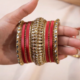 Set of 34 Shining Kundan bangle set by Leshya