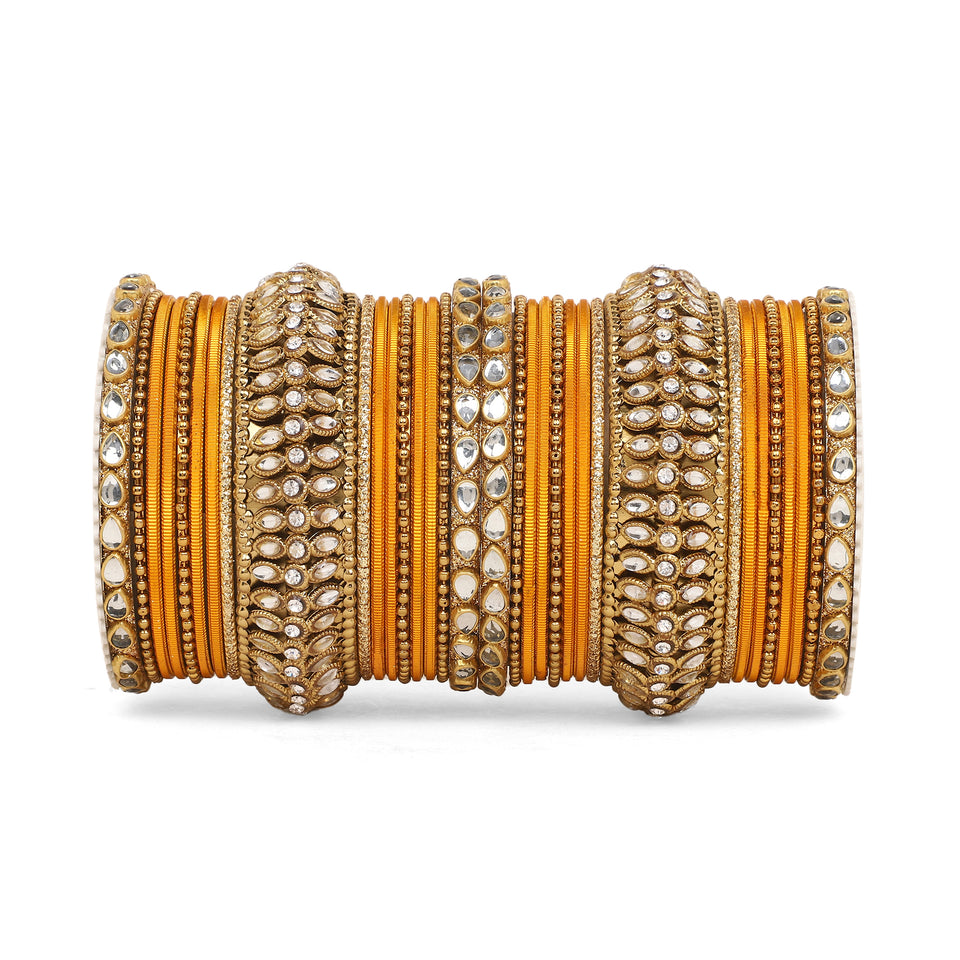 Set of 34 Shining Kundan bangle set by Leshya