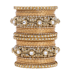 Luxurious Golden dotted and Jaaliwork bangle set by Leshya