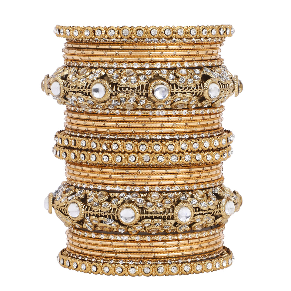 Luxurious Golden dotted and Jaaliwork bangle set by Leshya