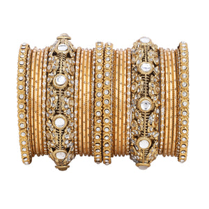 Luxurious Golden dotted and Jaaliwork bangle set by Leshya