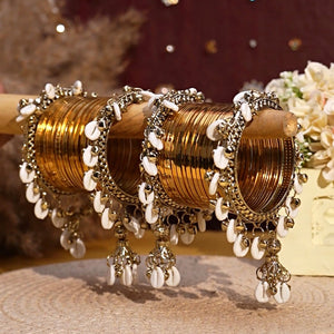 Shell hanging Bangle set by Leshya for both hands