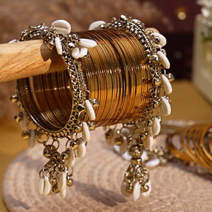 Shell hanging Bangle set by Leshya for both hands