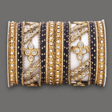 Golden dotted and Stone bangle set by Leshya