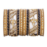 Golden dotted and Stone bangle set by Leshya