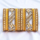 Golden dotted and Stone bangle set by Leshya