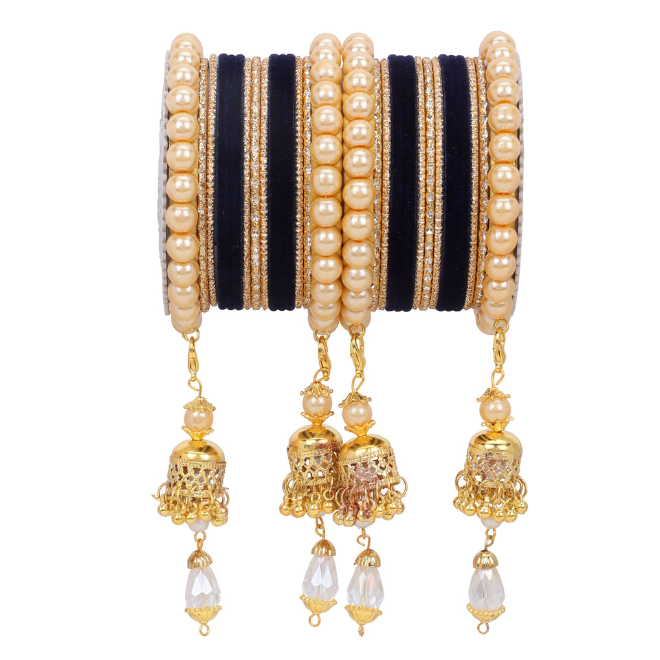 Traditional Pearl Jhumki and Velvet Bangle set by Leshya