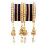 Traditional Pearl Jhumki and Velvet Bangle set by Leshya