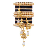 Traditional Pearl Jhumki and Velvet Bangle set by Leshya