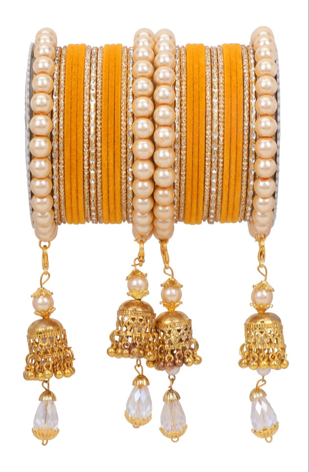 Traditional Pearl Jhumki and Velvet Bangle set by Leshya