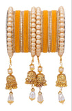 Traditional Pearl Jhumki and Velvet Bangle set by Leshya