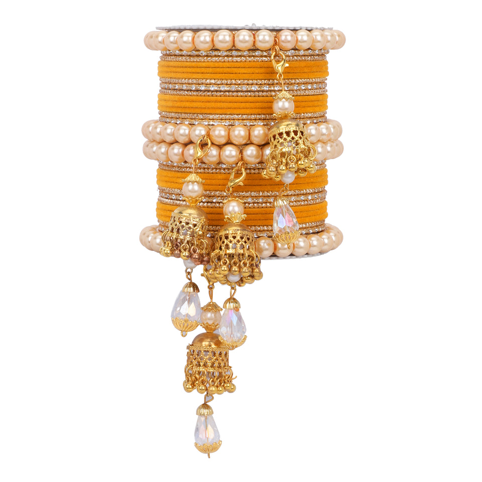 Traditional Pearl Jhumki and Velvet Bangle set by Leshya