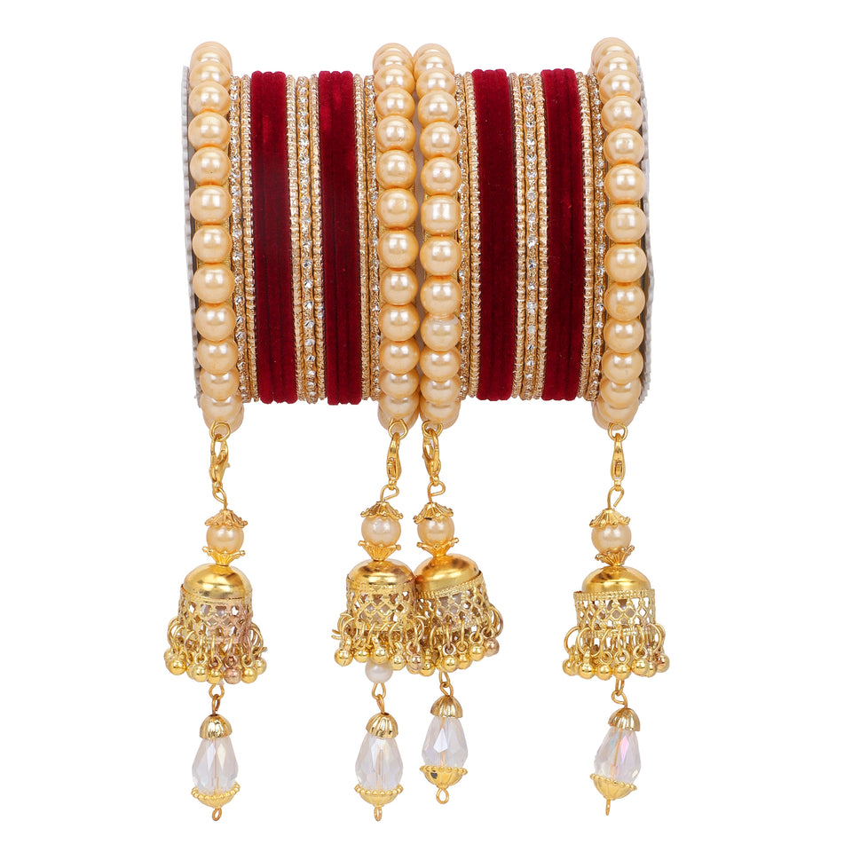 Traditional Pearl Jhumki and Velvet Bangle set by Leshya