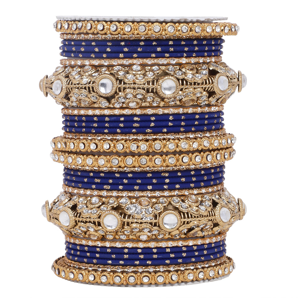 Luxurious Golden dotted and Jaaliwork bangle set by Leshya