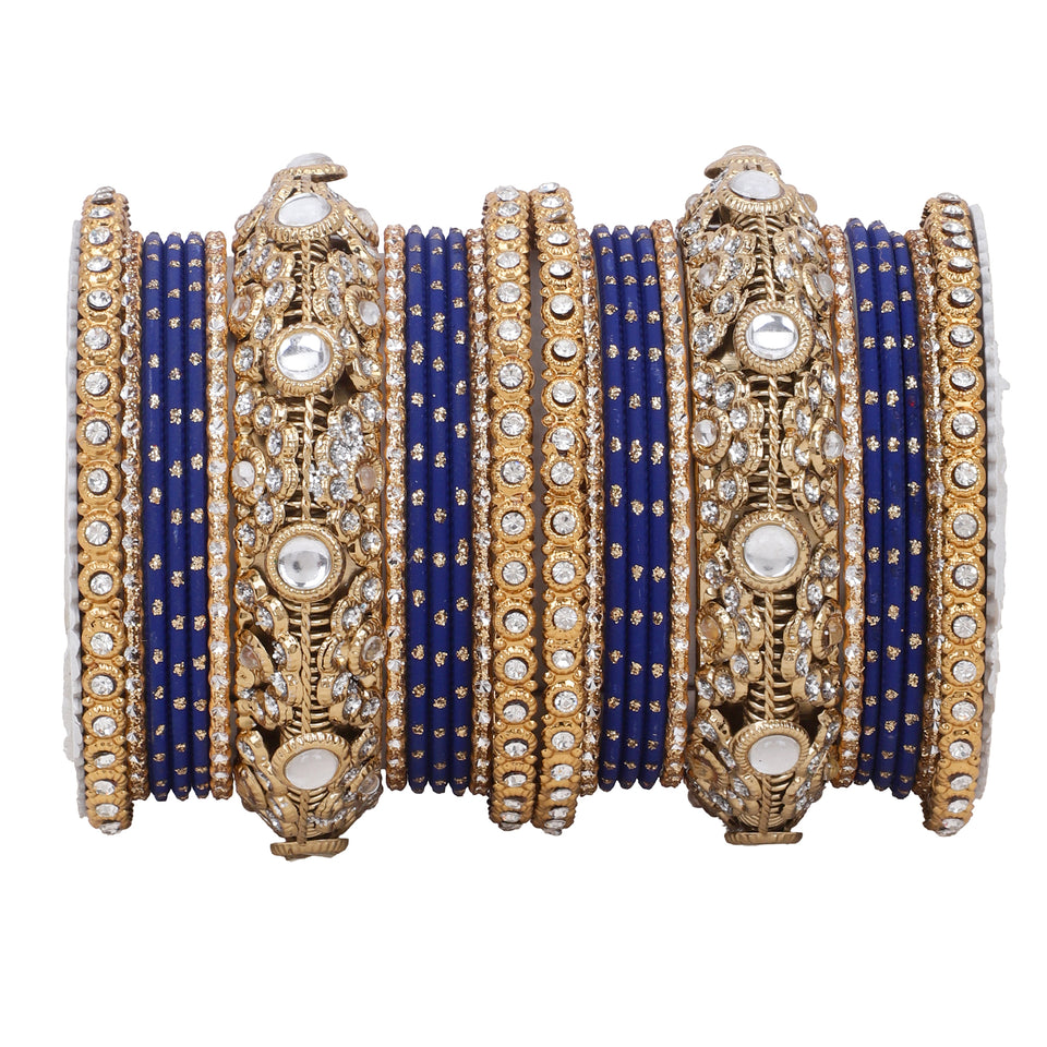 Luxurious Golden dotted and Jaaliwork bangle set by Leshya