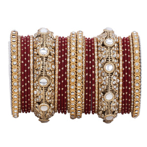 Luxurious Golden dotted and Jaaliwork bangle set by Leshya