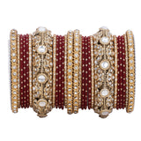 Luxurious Golden dotted and Jaaliwork bangle set by Leshya