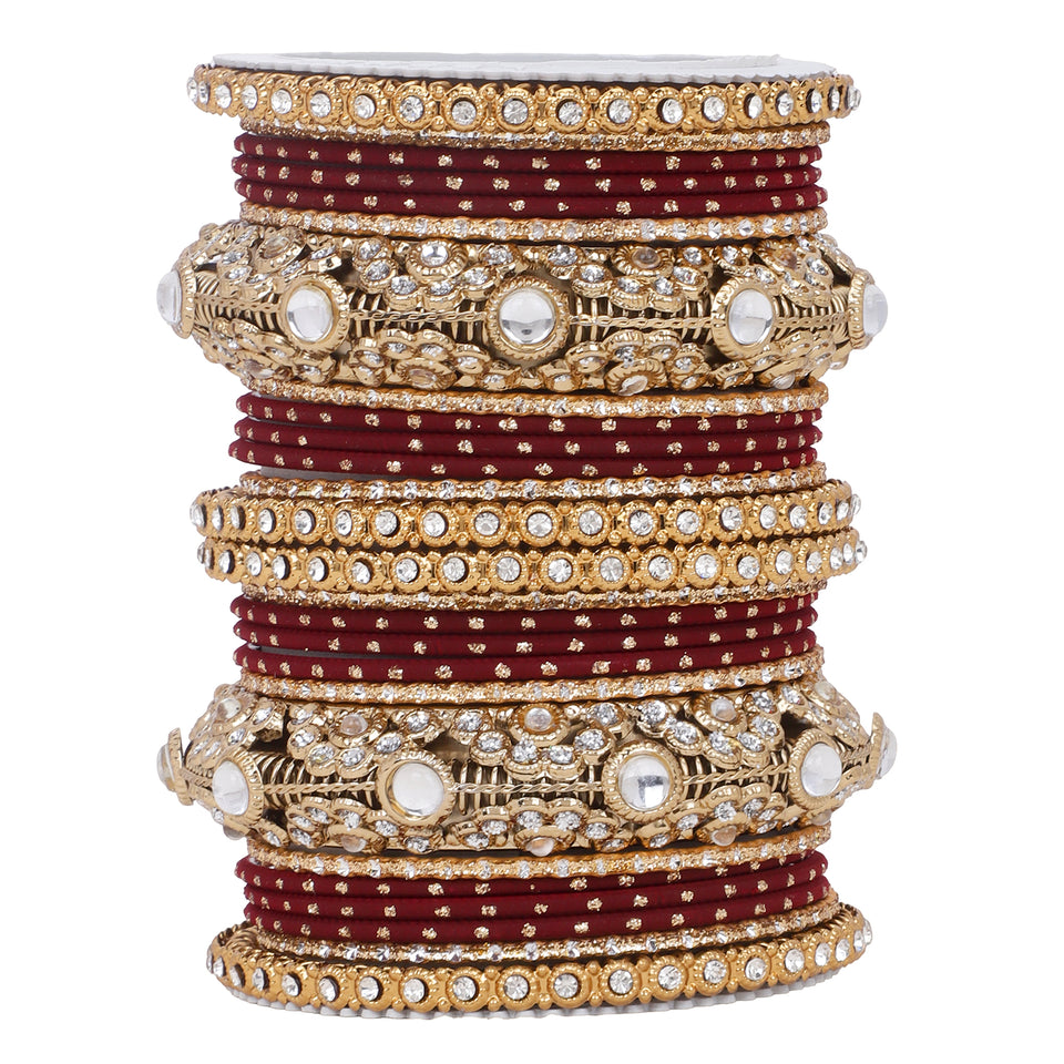 Luxurious Golden dotted and Jaaliwork bangle set by Leshya