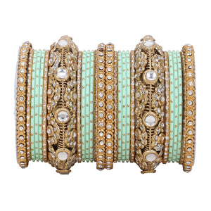 Luxurious Golden dotted and Jaaliwork bangle set by Leshya