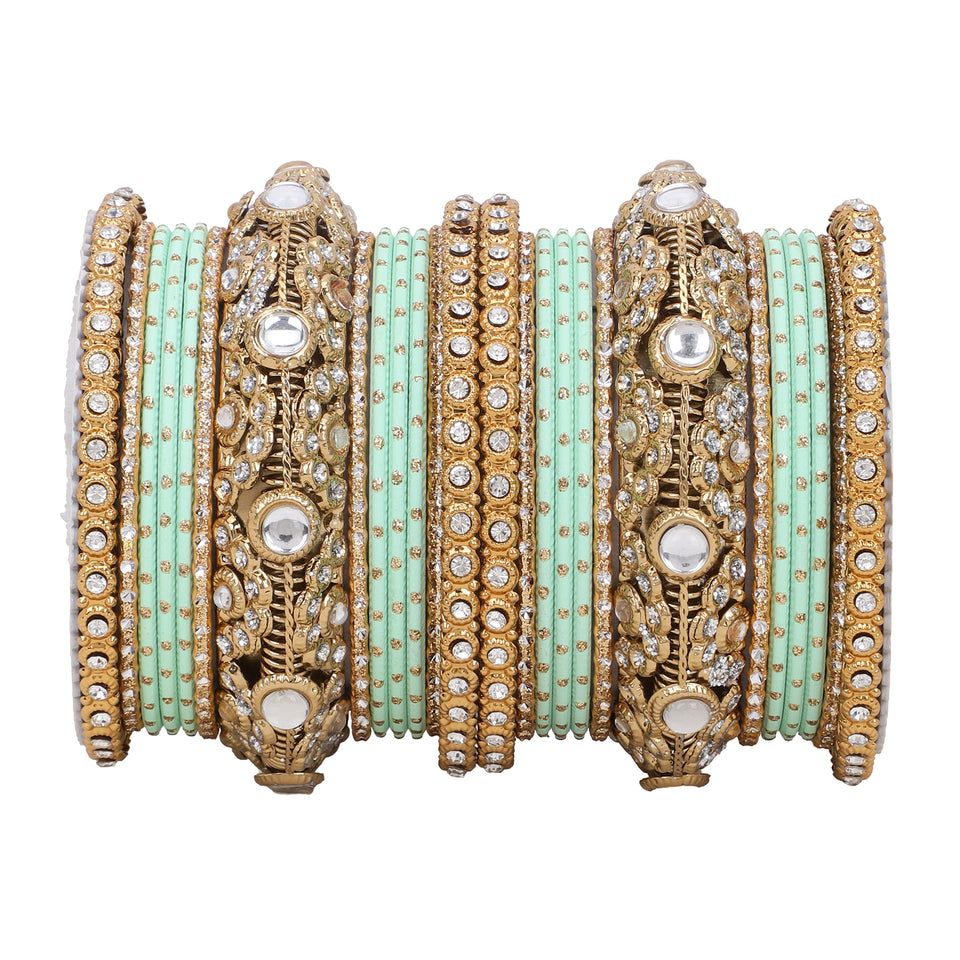 Luxurious Golden dotted and Jaaliwork bangle set by Leshya