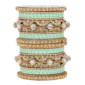 Luxurious Golden dotted and Jaaliwork bangle set by Leshya