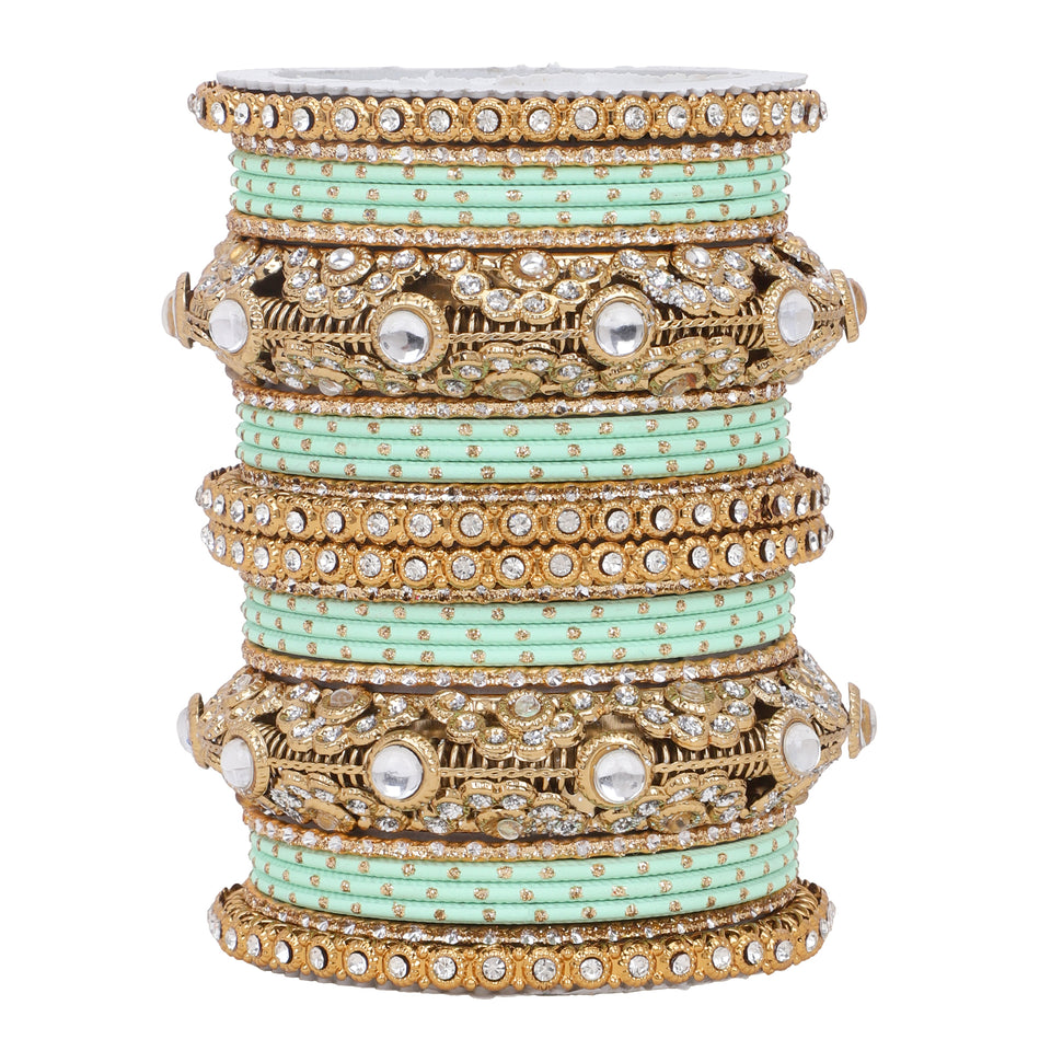 Luxurious Golden dotted and Jaaliwork bangle set by Leshya