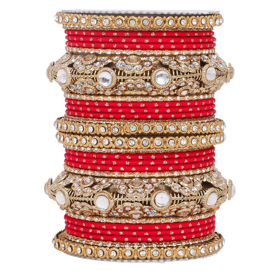 Luxurious Golden dotted and Jaaliwork bangle set by Leshya
