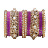 Luxurious Golden dotted and Jaaliwork bangle set by Leshya