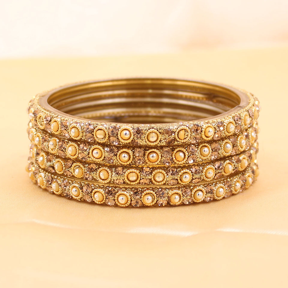 Set of 4 Golden Glass Bangles with Polki Beads by Leshya