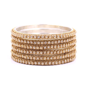 Brass Based Bangles with Golden Zari and Bead work by Leshya