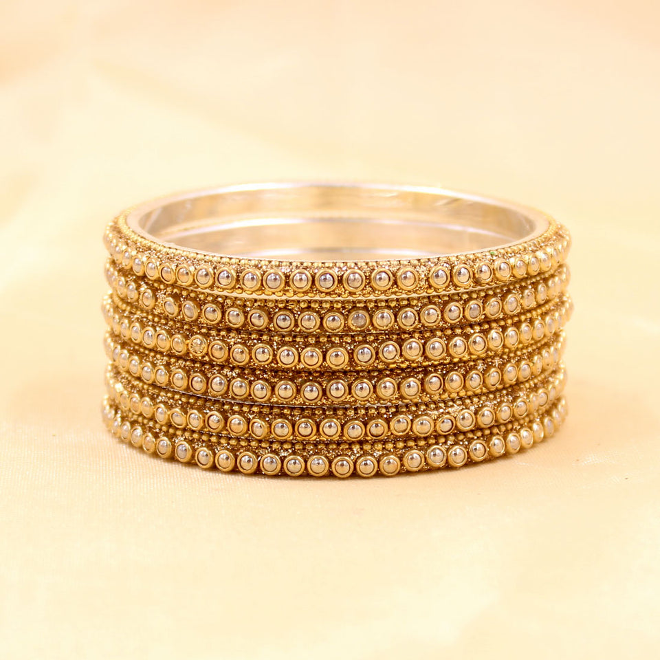 Brass Based Bangles with Golden Zari and Bead work by Leshya