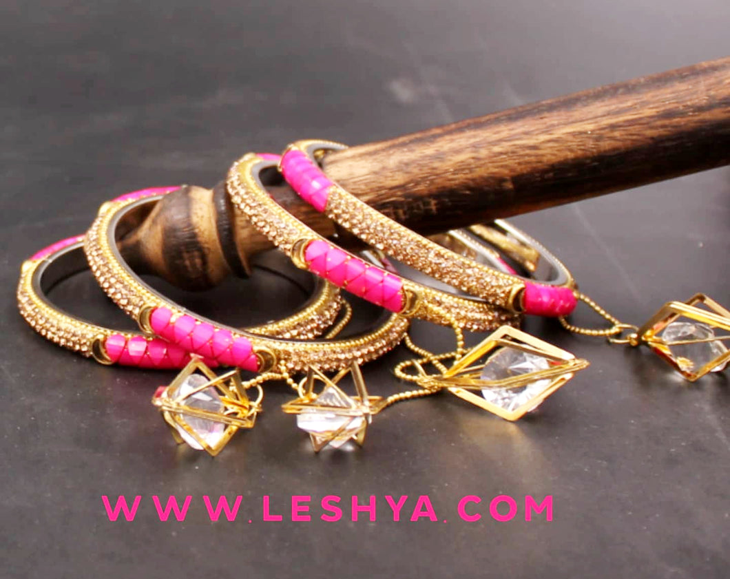 Set of 4 Lac with Golden stone Dangler Bangles by Leshya