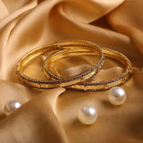 Pair Of Golden Bracelets With Golden Stonework For Daily Wear
