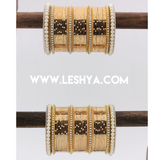 Metal Shining Bangle Set with Pearl Sides by Leshya